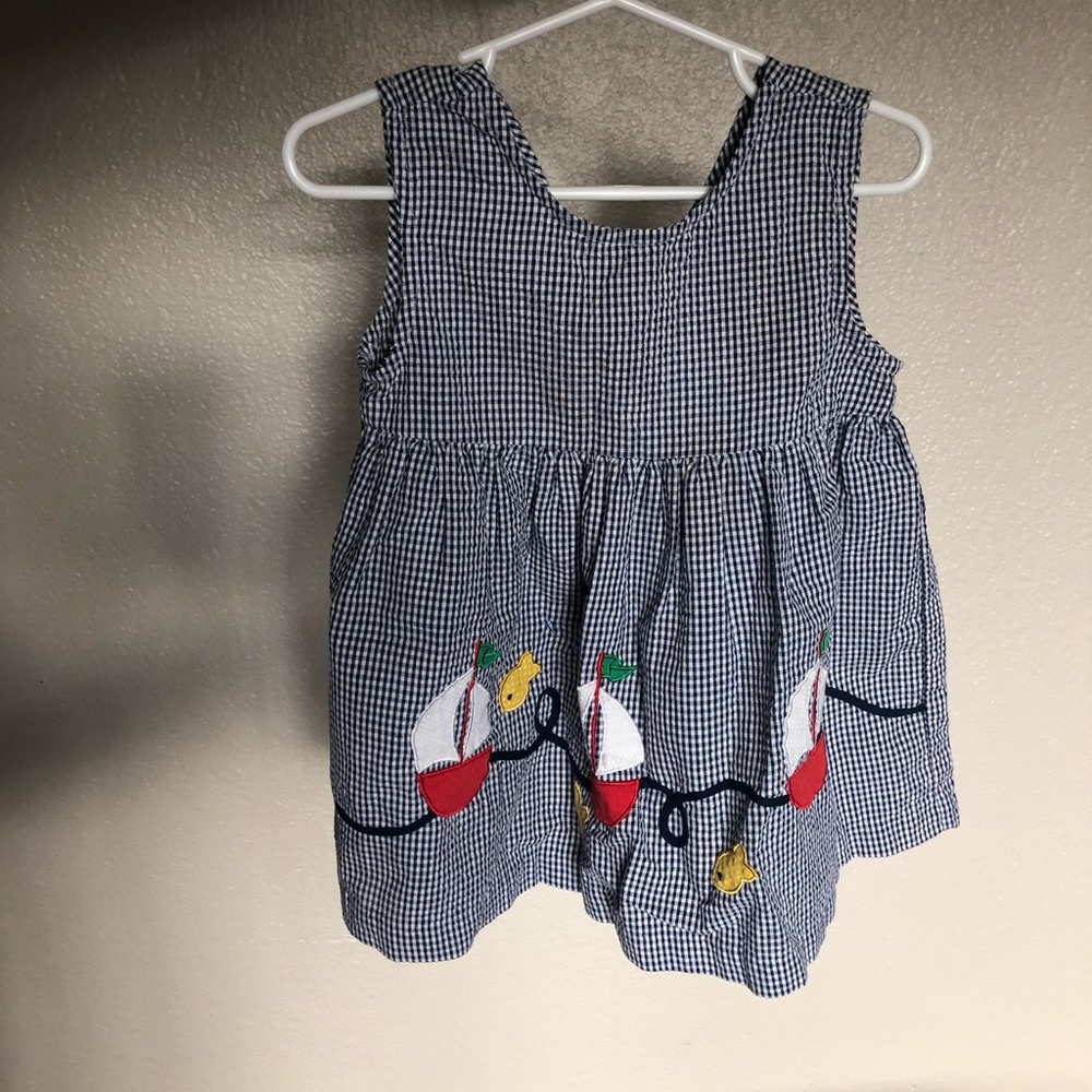 Unique baby girl dress- v cut button down back